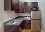 Thumbnail 2 of 25 - junior studio A kitchen at hampton courts apartments in washington dc