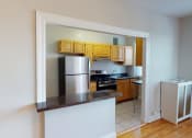Thumbnail 11 of 25 - Hampton Courts Apartments One Bedroom Kitchen and Bar