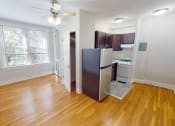 Thumbnail 1 of 25 - studio A living space and entry way at hampton courts apartments in Washington dc