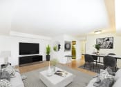 Thumbnail 4 of 14 - living area with sofa, coffee table, dining area, tv, and hardwood flooring at jasper place apartments in washington dc