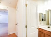 Thumbnail 10 of 14 - hallway view of bathroom and bedroom at jasper place apartments in congress heights washington dc
