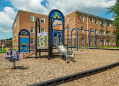 Thumbnail 12 of 16 - playground with jungle gym at jetu apartments in washington dc