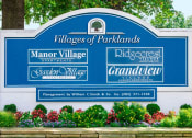 Thumbnail 15 of 15 - Villages of parklands monument sign next to manor village apartments in washington dc