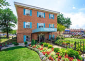 Thumbnail 9 of 15 - exterior brick view of manor village  tax credit apartments in washington dc