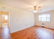 Thumbnail 12 of 15 - vacant bedroom with hardwood flooring and ceiling fan at new horizon apartments in washington dc