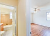Thumbnail 10 of 15 - hallway view of bathroom and bedroom area at new horizon apartments in washington dc
