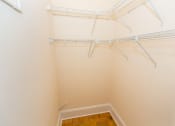 Thumbnail 4 of 28 - large walk in closet with shelving at the norwood apartments in adams morgan washington dc