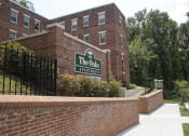 Thumbnail 1 of 14 - brick exterior of the oaks apartments in washington dc