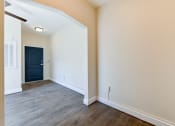Thumbnail 5 of 28 - vacant living area with wood flooring at petworth station apartments in washington dc
