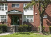 Thumbnail 1 of 14 - brick exterior of pleasant hills apartments in washington dc