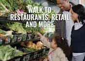 Thumbnail 20 of 21 - A family is shopping for vegetables in a grocery store.