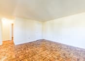 Thumbnail 13 of 22 - vacant living area with hardwood flooring at richman apartments in washington dc