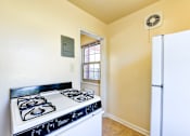 Thumbnail 10 of 22 - kitchen with white appliances at richman apartments in washington dc