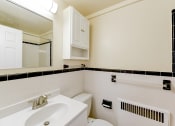 Thumbnail 11 of 20 - bathroom with sink, mirror medicine cabinet and tile detail at sherry hall in washington dc