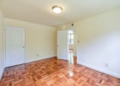 Thumbnail 9 of 21 - living area with wood flooring at shipley park apartments in shipley terrace washington dc
