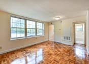 Thumbnail 12 of 21 - living area with wood flooring at shipley park apartments in shipley terrace washington dc