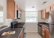 Thumbnail 1 of 15 - T-Street-Apartments-Kitchen