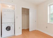 Thumbnail 8 of 14 - laundry area at the oaks apartments in washington dc