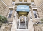 Thumbnail 20 of 21 - entrance of cortland apartments with green awning in washington dc