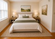Thumbnail 9 of 20 - A bedroom with a large bed and two lamps.