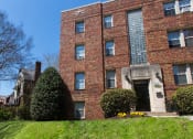 Thumbnail 17 of 17 - exterior of brick apartment building at 1400 Van Burent in washington dc