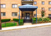 Thumbnail 23 of 27 - exterior entrance of washington view apartments in southeast dc