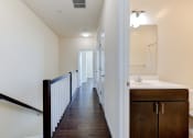 Thumbnail 7 of 14 - upstairs hallway with view of bathroom at sheridan station south townhomes in washington dc