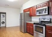 Thumbnail 14 of 29 - Chef-Inspired Kitchens Feature Stainless Steel Appliances at Ingram Manor Apartments, Pikesville, 21208