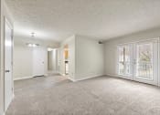 Thumbnail 12 of 23 - Vacant Living Room at Bradford Gwinnett Apartments, Norcross Georgia