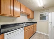 Thumbnail 8 of 23 - Kitchen at Bradford Gwinnett Apartments, Norcross