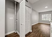 Thumbnail 21 of 35 - A room with a white door and a window. at Crogman School Lofts, Atlanta GA