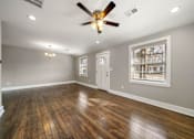 Thumbnail 2 of 29 - Living room with ceiling fan at Balfour Marietta Apartments, Marietta, GA, 30060