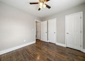 Thumbnail 13 of 29 - A bedroom with a bed, a ceiling fan at Balfour Marietta Apartments, Marietta, GA, 30060
