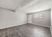 Thumbnail 2 of 18 - Unfurnished Living Room at Balfour Forest Apartments, Georgia, 30008