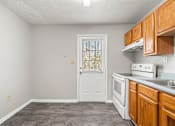 Thumbnail 8 of 18 - Fully Furnished Kitchen at Balfour Forest Apartments, Georgia, 30008