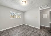 Thumbnail 4 of 18 - Living room at Balfour Forest Apartments, Georgia