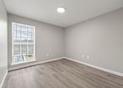 Thumbnail 23 of 29 - Room with wooden flooring at 2000 Oasis Apartments, Atlanta, GA, 30316