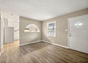 Thumbnail 3 of 32 - Living room with Bedroom with New Modern Flooring Throughout at Balfour 296, Lilburn, GA