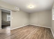 Thumbnail 11 of 32 - Bedroom with New Modern Flooring Throughout at Balfour 296, Lilburn, GA 30047