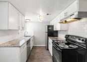 Thumbnail 3 of 36 - Upgraded kitchen at Northgate Townhomes in Tucker, GA