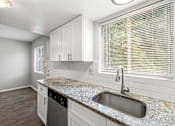 Thumbnail 7 of 36 - Upgraded kitchen at Northgate Townhomes in Tucker, GA  30084