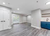 Thumbnail 6 of 32 - Living And Kitchen at Woodbriar Management, LLC, Tucker, GA