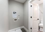 Thumbnail 17 of 32 - Washer/Dryer Hookups at Woodbriar Management, LLC, Tucker, 30084