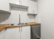 Thumbnail 24 of 32 - Kitchen Cabinets at Woodbriar Management, LLC, Georgia, 30084
