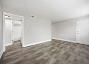 Thumbnail 5 of 30 - Living room at Ridgewood Apartments in Lawrenceville, Georgia 30046.