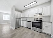 Thumbnail 10 of 30 - Upgraded kitchen at Ridgewood Apartments in Lawrenceville, Georgia 30046.
