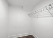 Thumbnail 29 of 30 - Closet with empty shelves at Balfour Chastain, Sandy Springs, GA, 30342 