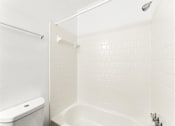 Thumbnail 20 of 35 - White shower area at Pinewood Townhomes, Tucker, GA, 30084