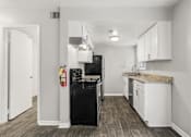 Thumbnail 30 of 35 - White Kitchen Interior at Pinewood Townhomes, Georgia, 30084