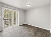 Thumbnail 25 of 35 - Living room with wooden floor at Pinewood Townhomes, Tucker, GA, 30084